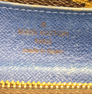 Portefeuille Louis Vuitton Modèle Emilie en Toile Monogram Marron