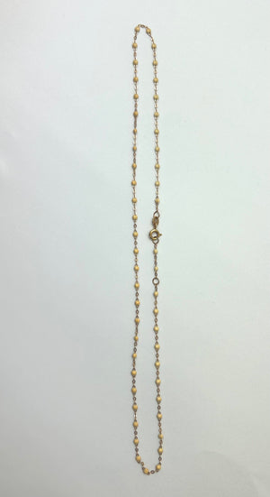 Collier ras du cou perles résine beige or 18 carats