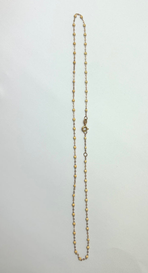 Collier ras du cou perles résine beige or 18 carats