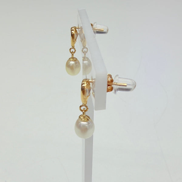 Boucles d'oreilles pendantes en or jaune 18k