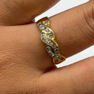 Bague en or jaune avec zirconiums 18 K