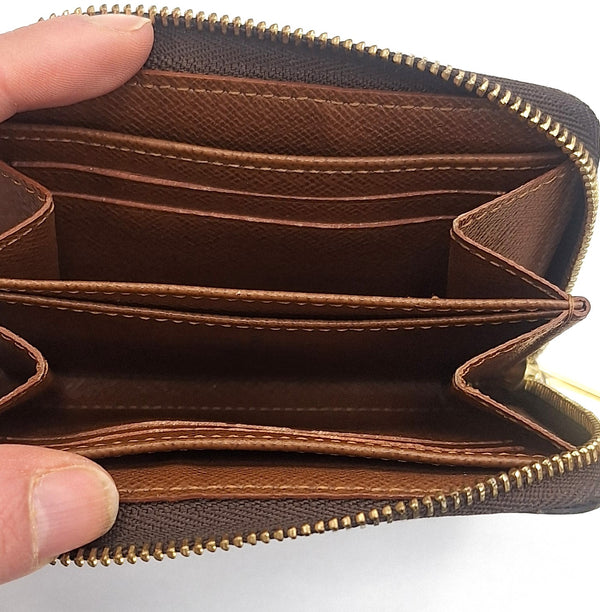 Porte-monnaie Louis Vuitton Zippy en toile monogramme marron
