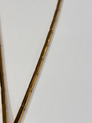 Collier en Or jaune et or gris 18K 22.65g Grs
