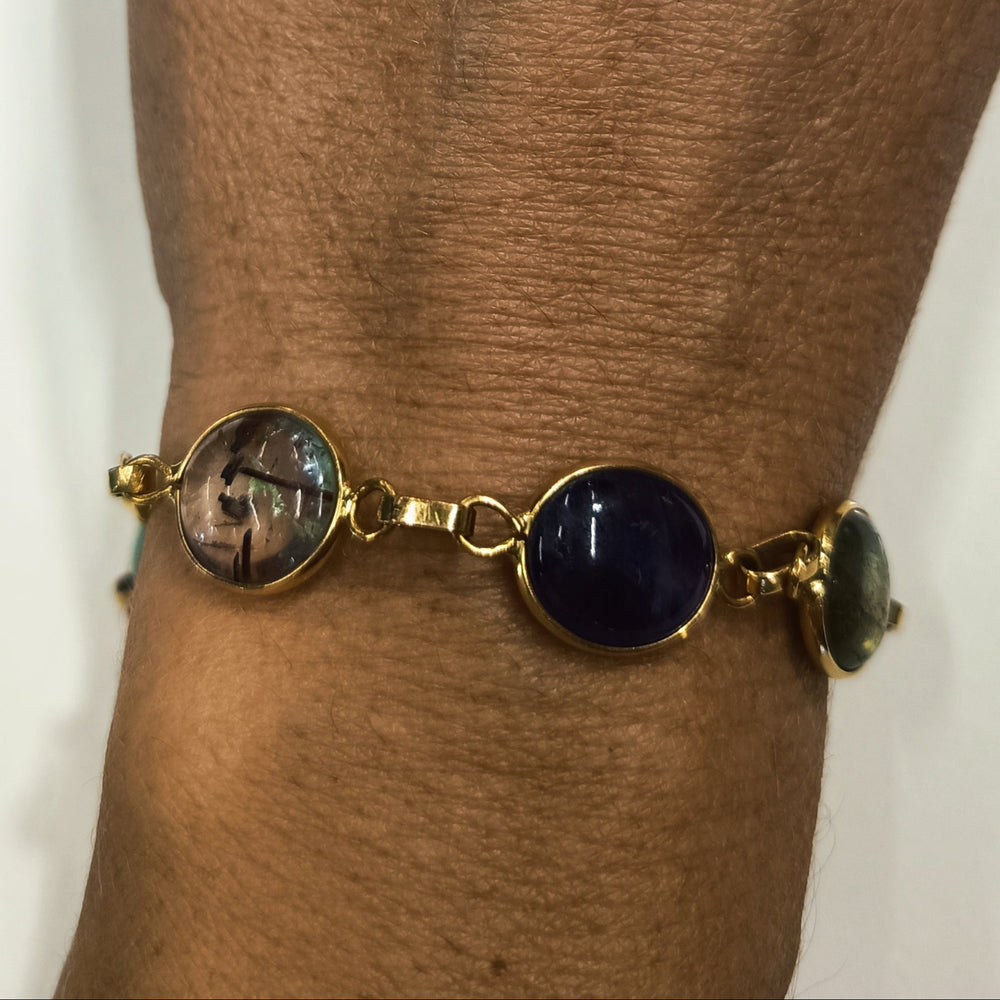 Bracelet en or avec 7 pierres naturelles