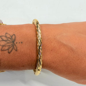 Bracelet jonc torsadé en or jaune 18 K
