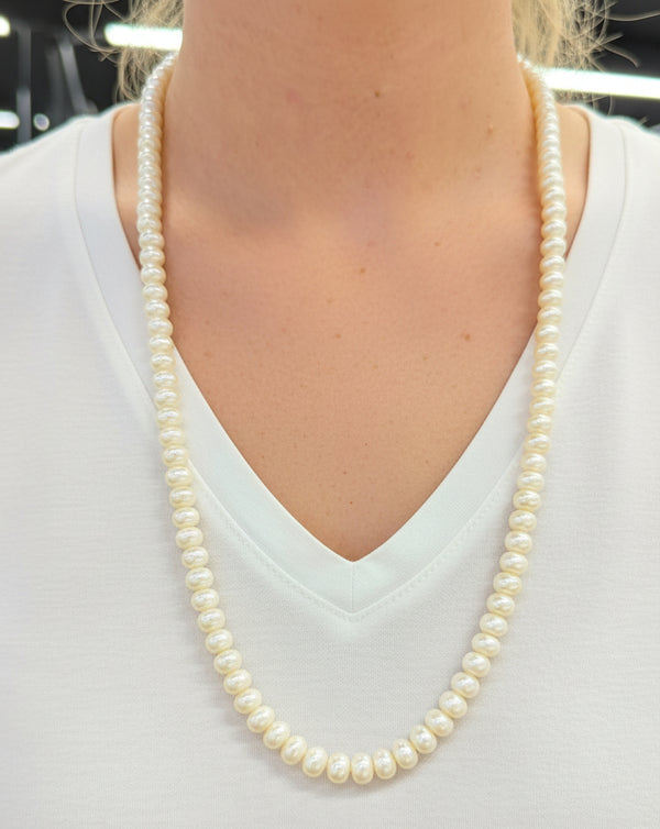 Collier sautoir en or jaune 18 carats et Perles