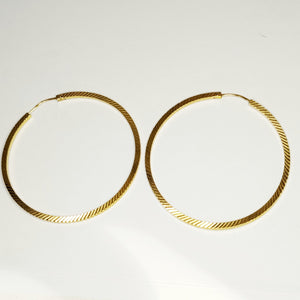 Boucles d'oreilles créoles en or jaune 18K 7.29 Grs