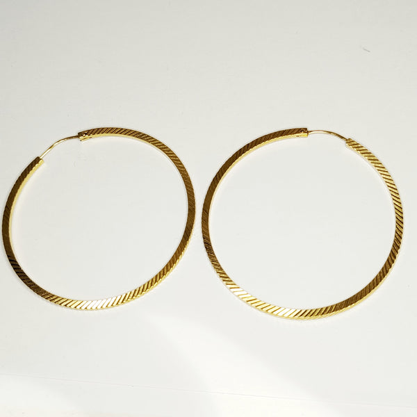 Boucles d'oreilles créoles en or jaune 18K 7.29 Grs