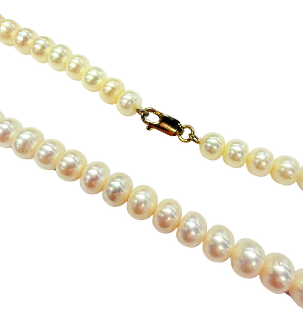 Collier sautoir en or jaune 18 carats et Perles