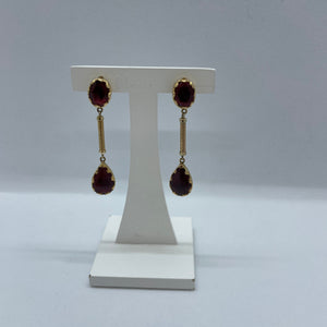 Boucles d’oreilles pendantes en or jaune 18 K avec grenats