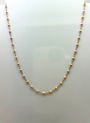 Collier ras du cou perles résine beige or 18 carats