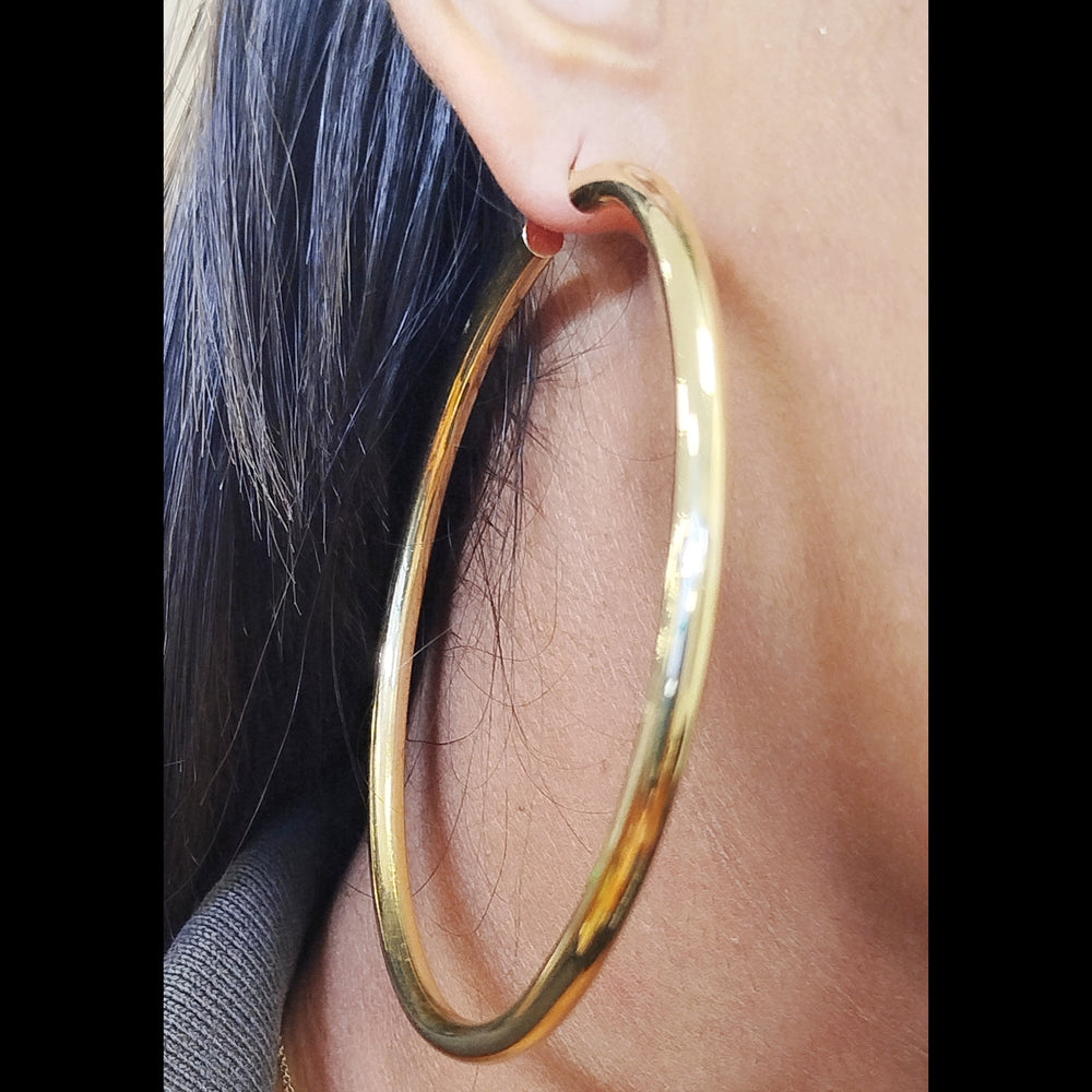 Boucles d'oreilles créoles en or jaune 18K - 8.86gr