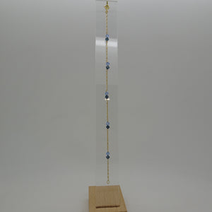 Bracelet or avec pierres bleues