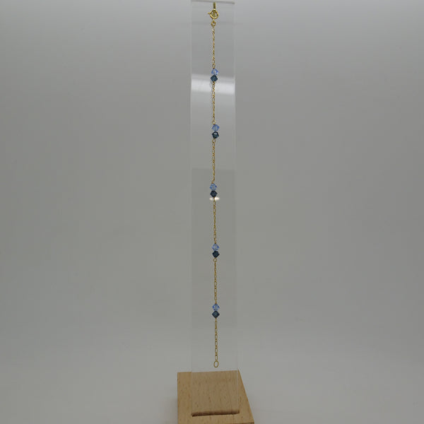 Bracelet or avec pierres bleues