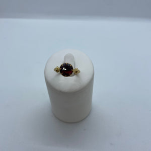 Bague en or jaune 18 carats avec grenat – T 55