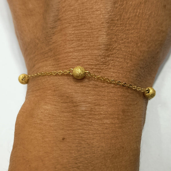 Bracelet artisanal en or jaune 18 K