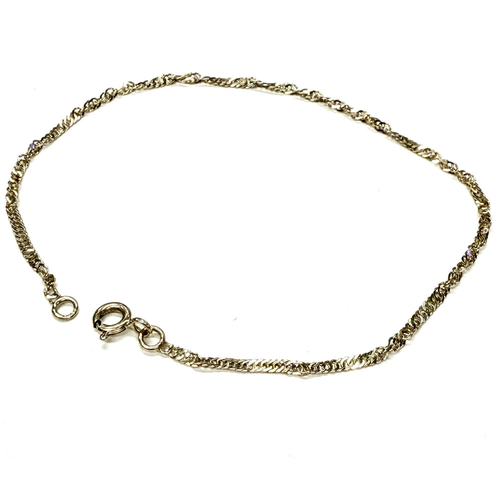 Bracelet torsadé en or jaune 18K - 1.25 Grs