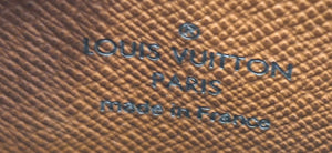 Porte-monnaie Louis Vuitton Zippy en toile monogramme marron
