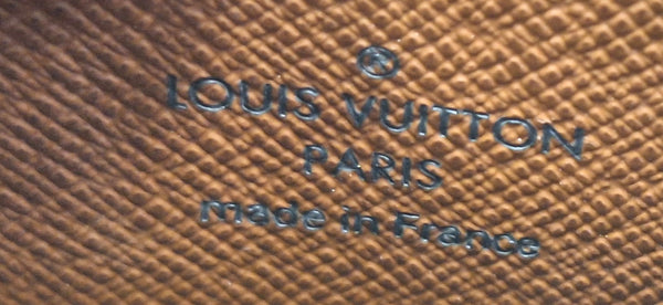Porte-monnaie Louis Vuitton Zippy en toile monogramme marron