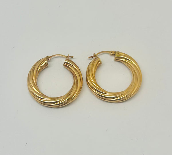 Boucles d'oreilles créoles en or jaune 18K