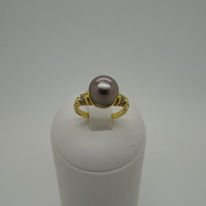 Bagues en Or jaune 18K avec perle de Tahiti et diamants