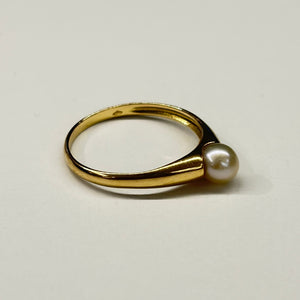 Solitaire en or jaune 18k avec perle naturelle