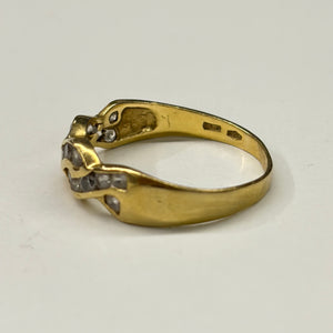 Bague en or jaune avec zirconiums 18 K