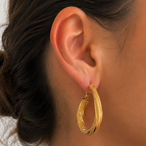 Boucles d'oreilles créoles en or jaune 18