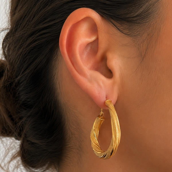 Boucles d'oreilles créoles en or jaune 18