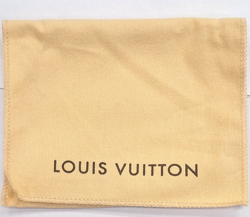 Porte-monnaie Louis Vuitton Zippy en toile monogramme marron