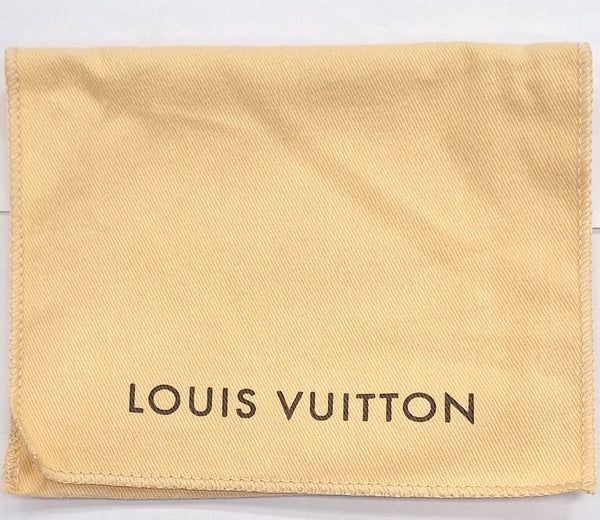 Porte-monnaie Louis Vuitton Zippy en toile monogramme marron