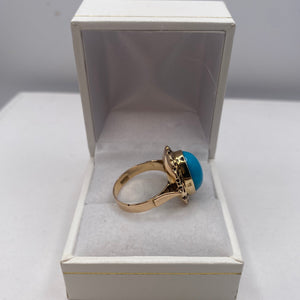 Bague en or jaune avec pierre turquoise 18 carats