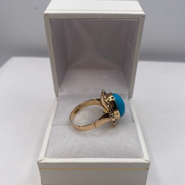 Bague en or jaune avec pierre turquoise 18 carats