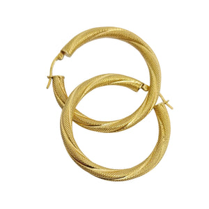Boucles d'oreilles créoles en or jaune 18