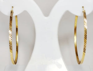 Boucles d'oreilles créoles en or jaune 18K 7.29 Grs