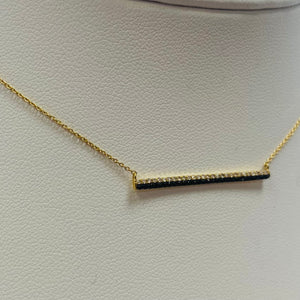Collier or avec diamants blancs et noirs