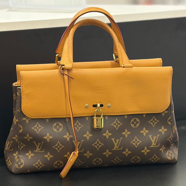 Sac à main Louis Vuitton Venus MNG épice très bon