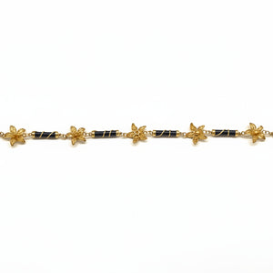 Bracelet fleur en or jaune 18k et coraux