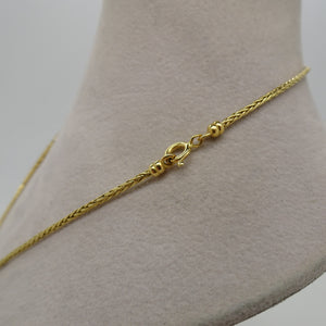Collier or maille palmier en chute