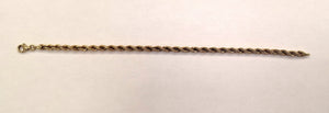 Bracelet en Or jaune 18K torsadé Lg18cm