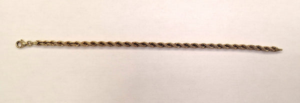 Bracelet en Or jaune 18K torsadé Lg18cm
