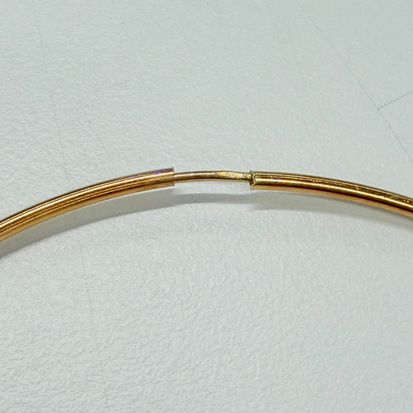 Boucles d'oreilles créoles en or jaune 18 K