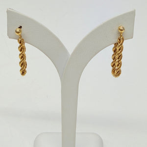 Boucles d'oreilles torsadées pendantes en Or Jaune 18k