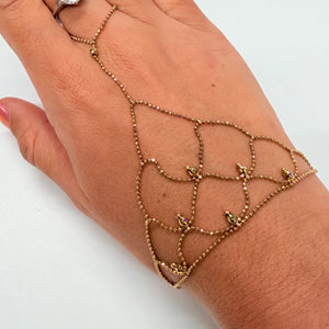 Bracelet main en or jaune 18 K