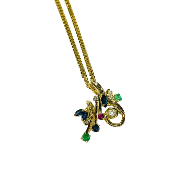 Pendentif en or Jaune et pierres précieuses