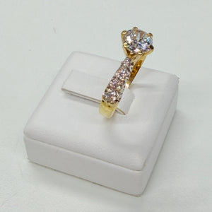 Bague or jaune 18k avec zirconium Taille 56