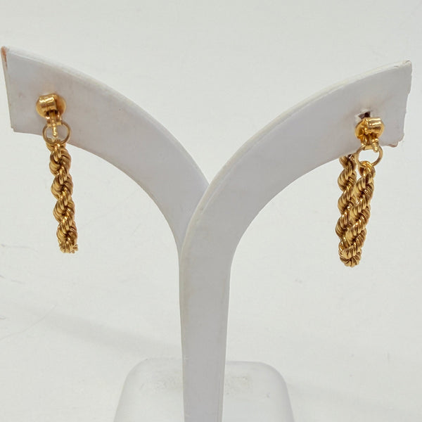 Boucles d'oreilles torsadées pendantes en Or Jaune 18k