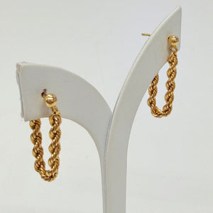 Boucles d'oreilles torsadées pendantes en Or Jaune 18k