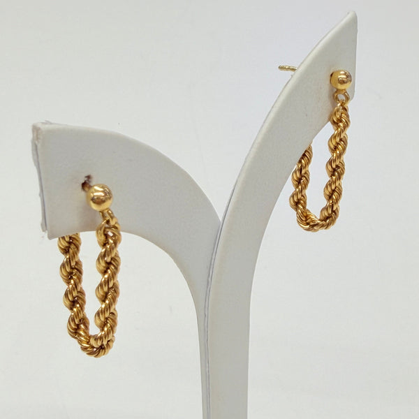 Boucles d'oreilles torsadées pendantes en Or Jaune 18k
