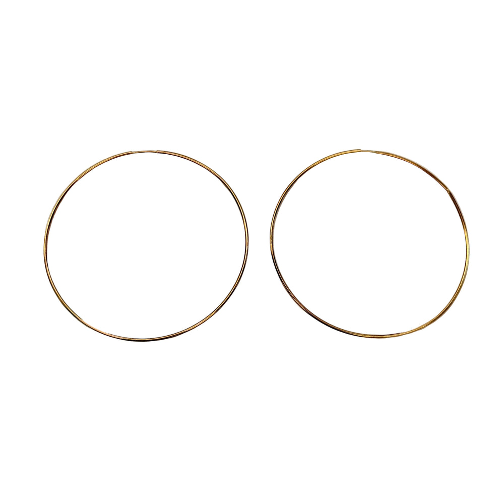 Boucles d'oreilles créoles en or jaune 18 K